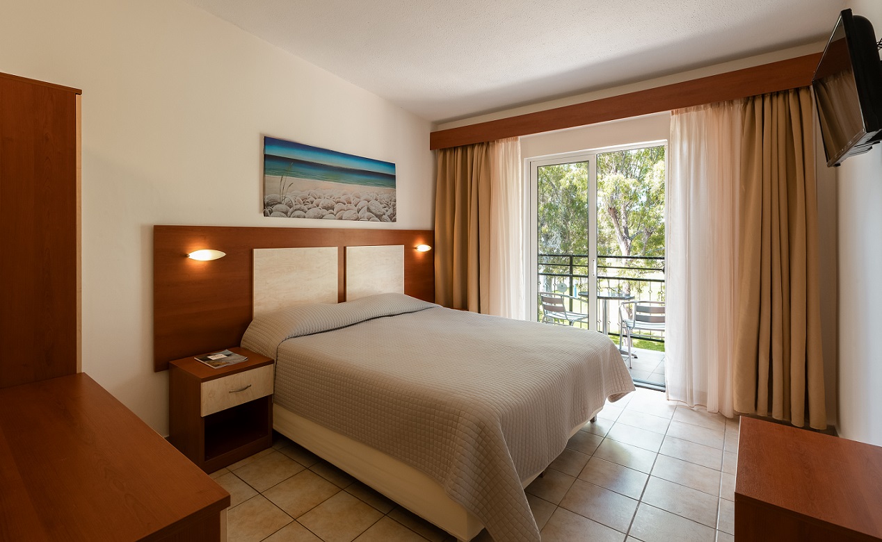 Tiara Holidays - Canvas by Mitsis Messonghi - single room garden view - bedroom